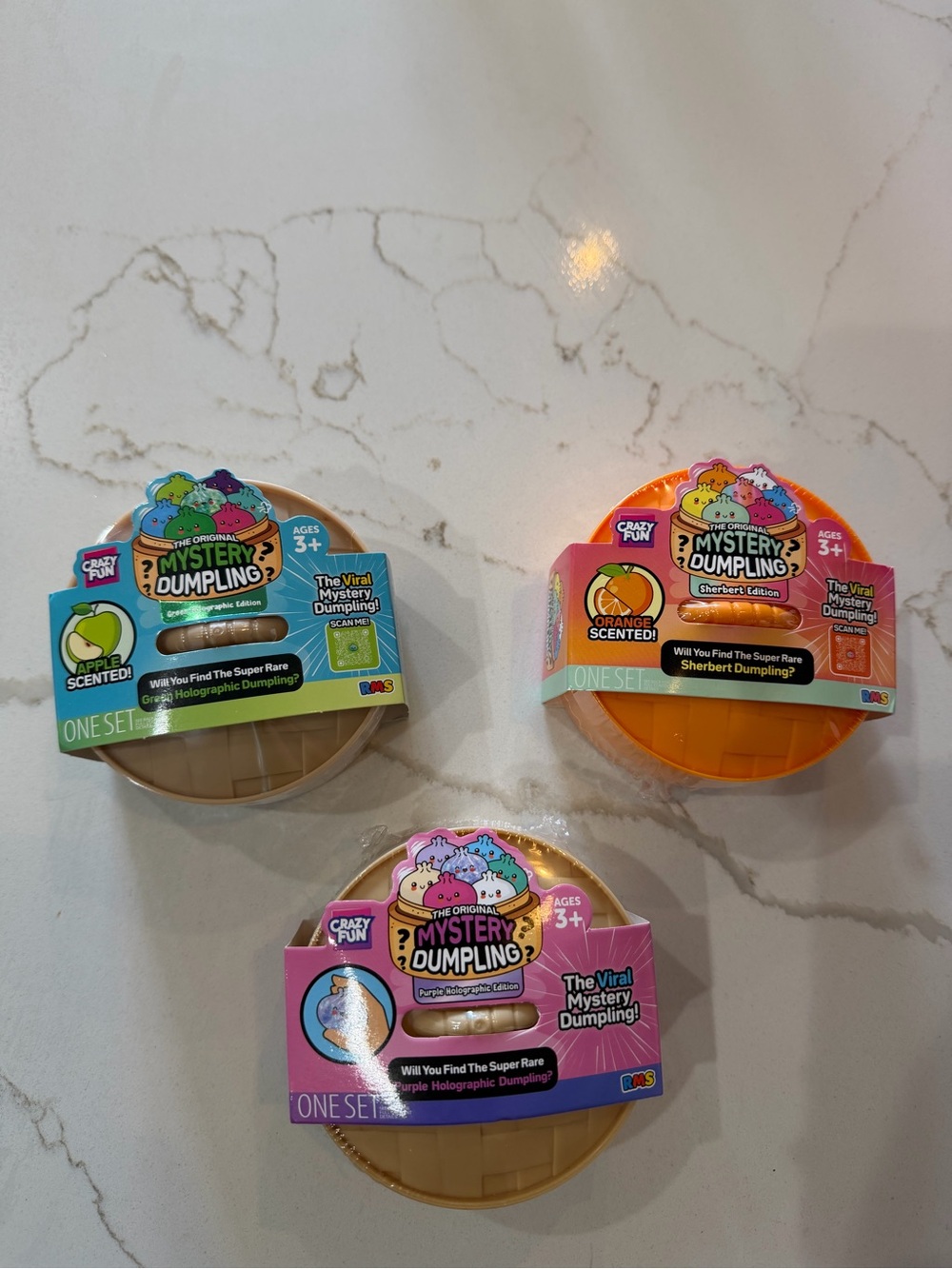 Mystery dumplings apple, purple holographic and sherbert dumplings bundle
